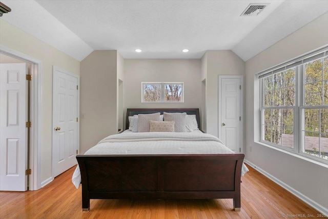 5 Pheasant Run, Guilford, CT 06437 - bedroom with vaulted ceiling, light wood-style flooring, and recessed lighting