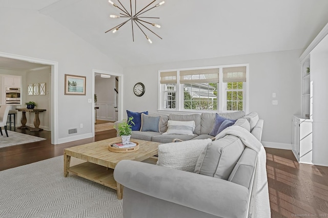 living room featuring a notable chandelier, baseboards, wood finished floors, lofted ceiling, and visible vents