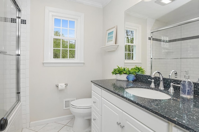 full bathroom with visible vents, a tile shower, vanity, baseboards, and ornamental molding