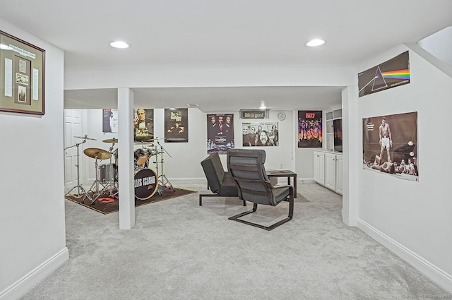sitting room with baseboards, carpet flooring, and recessed lighting