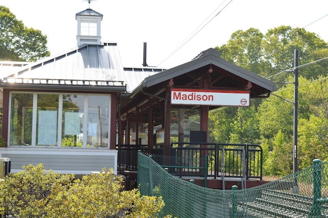 exterior space featuring a standing seam roof and metal roof