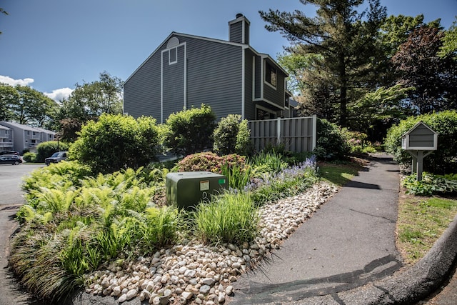 17 Ives Hill Ct Unit 17, Cheshire, CT 06410 - view of property exterior featuring a chimney