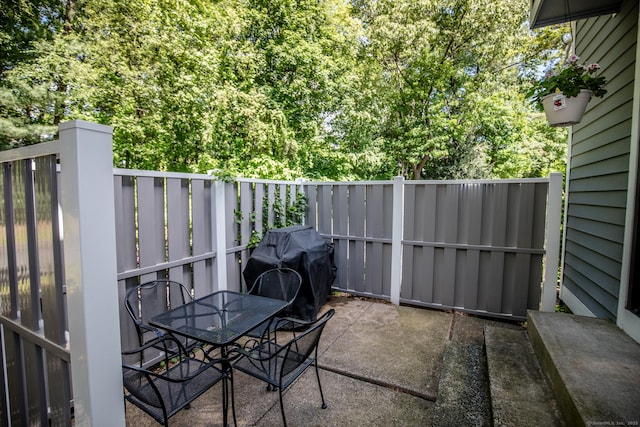 17 Ives Hill Ct Unit 17, Cheshire, CT 06410 - view of patio featuring outdoor dining space and a grill