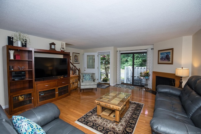 17 Ives Hill Ct Unit 17, Cheshire, CT 06410 - living room featuring wood finished floors and a textured ceiling