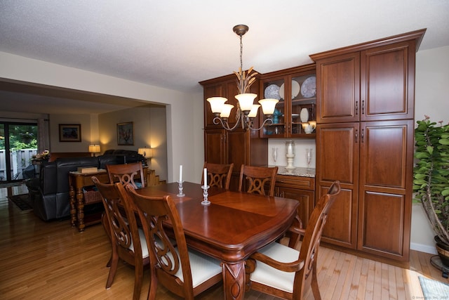 17 Ives Hill Ct Unit 17, Cheshire, CT 06410 - dining room featuring light wood-type flooring and a chandelier