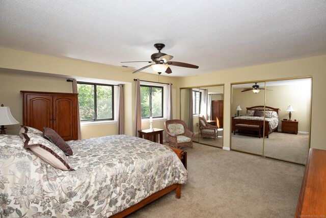 17 Ives Hill Ct Unit 17, Cheshire, CT 06410 - bedroom featuring multiple closets, light carpet, and ceiling fan