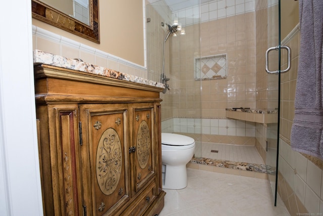 17 Ives Hill Ct Unit 17, Cheshire, CT 06410 - full bath with toilet, vanity, a stall shower, tile patterned floors, and tile walls
