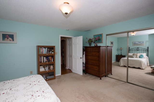 17 Ives Hill Ct Unit 17, Cheshire, CT 06410 - bedroom featuring light colored carpet, a closet, and baseboards
