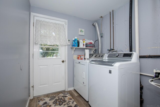 17 Ives Hill Ct Unit 17, Cheshire, CT 06410 - laundry area with washing machine and clothes dryer, wood finished floors, and baseboards