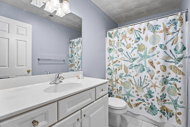 full bath featuring toilet, vanity, curtained shower, tile patterned flooring, and a chandelier