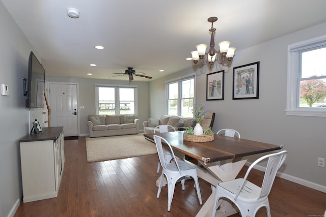 dining space featuring dark wood-style flooring, recessed lighting, baseboards, and a wealth of natural light
