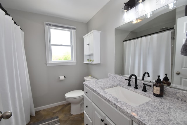full bathroom featuring baseboards, tile patterned flooring, vanity, and toilet