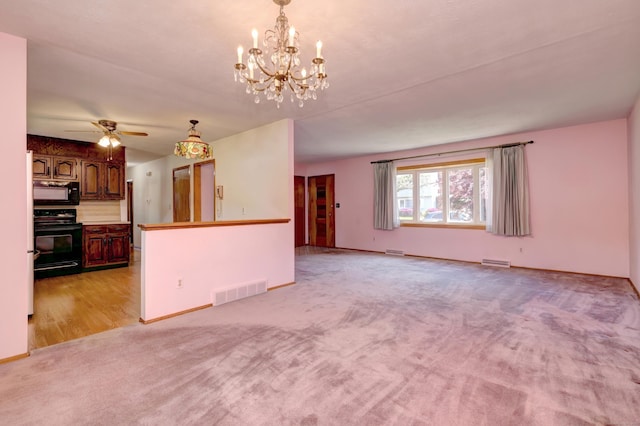 145 Russell Rd, Stratford, CT 06614 - unfurnished living room with light carpet, a chandelier, a ceiling fan, and baseboards