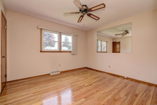 145 Russell Rd, Stratford, CT 06614 - spare room with a ceiling fan, light wood-style floors, and baseboards