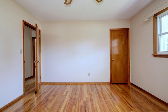 145 Russell Rd, Stratford, CT 06614 - empty room featuring light wood-type flooring, baseboards, and a ceiling fan