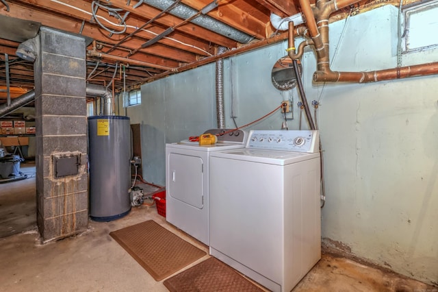 145 Russell Rd, Stratford, CT 06614 - laundry room with water heater and washer and clothes dryer