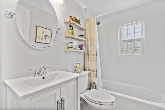 bathroom featuring toilet, shower / bath combination with curtain, and vanity