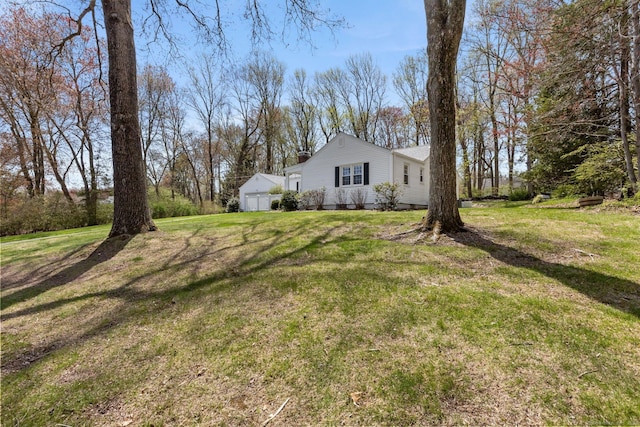 view of yard with an attached garage