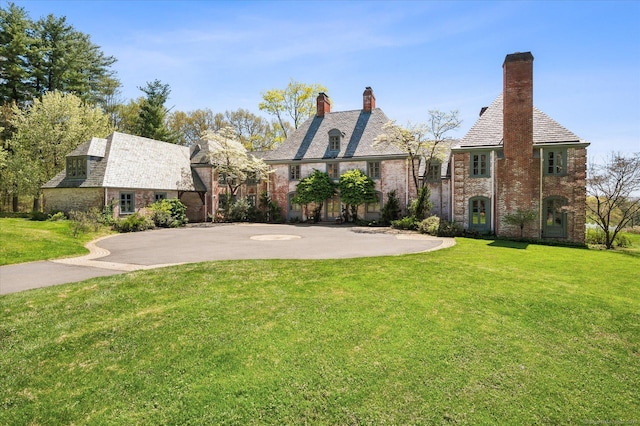 150 Cider Brook Rd, Avon, CT 06001 - view of front of property with a chimney and a front yard