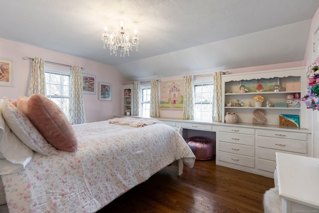 bedroom with dark wood-style flooring, vaulted ceiling, and an inviting chandelier