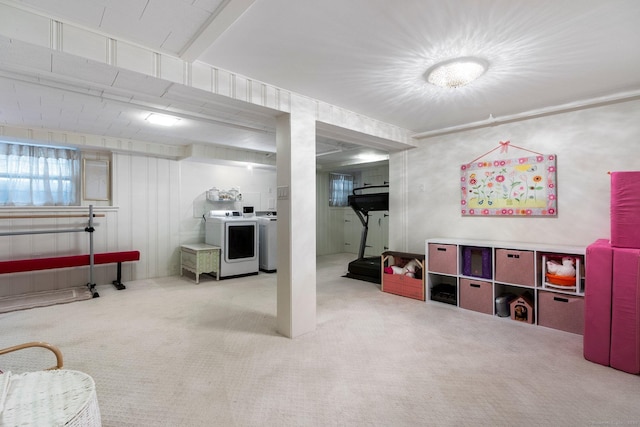 basement with carpet and independent washer and dryer