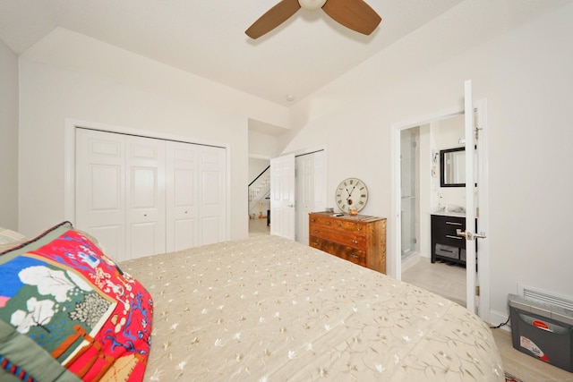 bedroom with a ceiling fan and ensuite bath