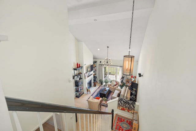 hall featuring a notable chandelier