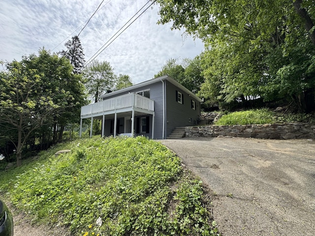 59 Fairfax St, Waterbury, CT 06704 - view of front of property with driveway and a balcony