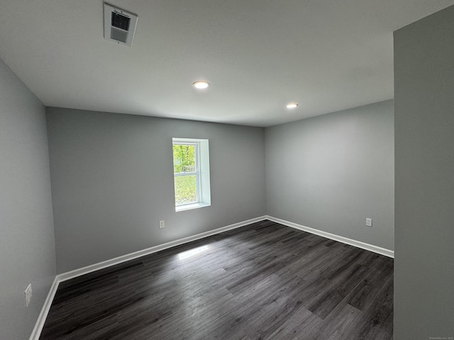 59 Fairfax St, Waterbury, CT 06704 - unfurnished room featuring dark wood-type flooring, baseboards, and recessed lighting