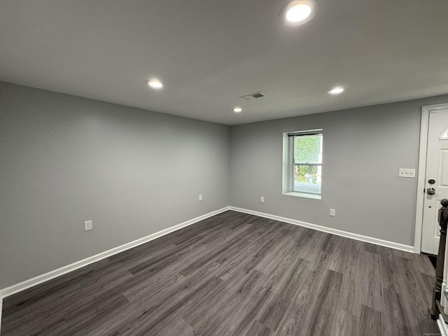 59 Fairfax St, Waterbury, CT 06704 - spare room with dark wood-style flooring, recessed lighting, and baseboards