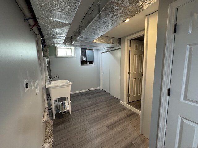 59 Fairfax St, Waterbury, CT 06704 - below grade area featuring wood finished floors and baseboards