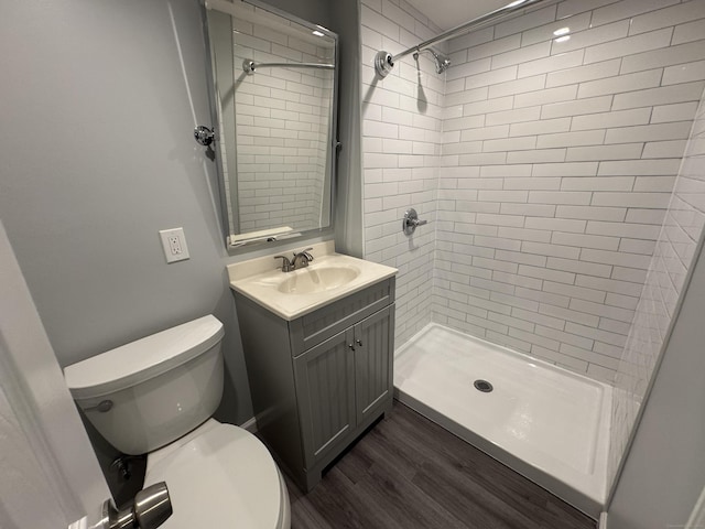 59 Fairfax St, Waterbury, CT 06704 - full bath with a shower stall, toilet, vanity, and wood finished floors