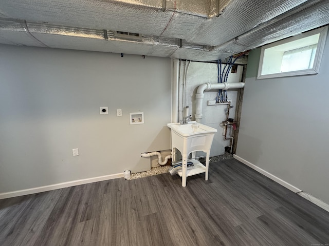 59 Fairfax St, Waterbury, CT 06704 - clothes washing area with hookup for an electric dryer, wood finished floors, washer hookup, and baseboards