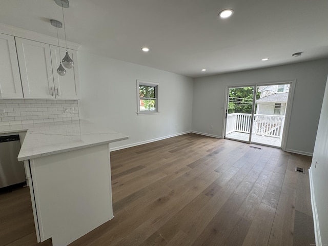 59 Fairfax St, Waterbury, CT 06704 - kitchen with dishwasher, healthy amount of natural light, white cabinetry, dark wood-style flooring, and recessed lighting