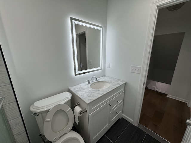 59 Fairfax St, Waterbury, CT 06704 - bathroom featuring toilet, vanity, and baseboards