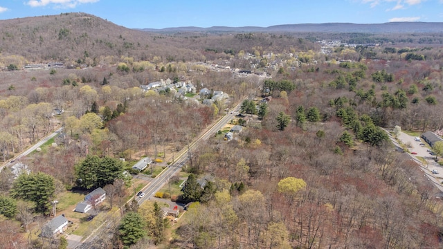 bird's eye view featuring a view of trees and a mountain view