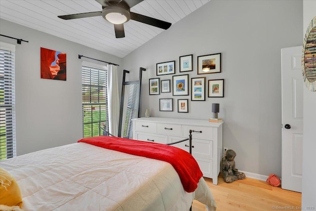bedroom featuring ceiling fan, baseboards, wooden ceiling, wood finished floors, and lofted ceiling
