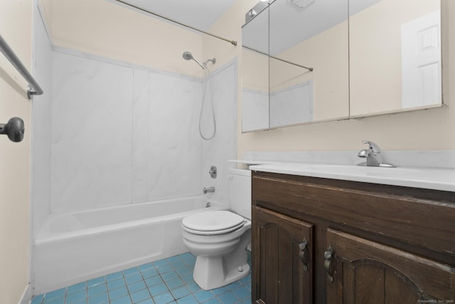 full bathroom featuring tile patterned flooring, toilet, shower / washtub combination, and vanity