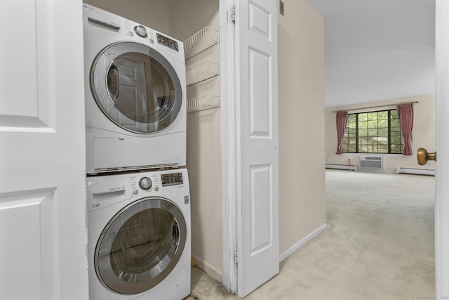 laundry room featuring estacked washer and dryer, carpet floors, a baseboard heating unit, a wall mounted AC, and baseboards