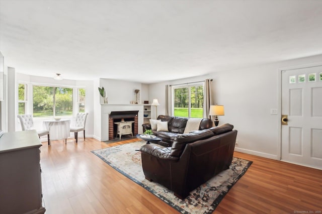 living room featuring baseboards and wood finished floors