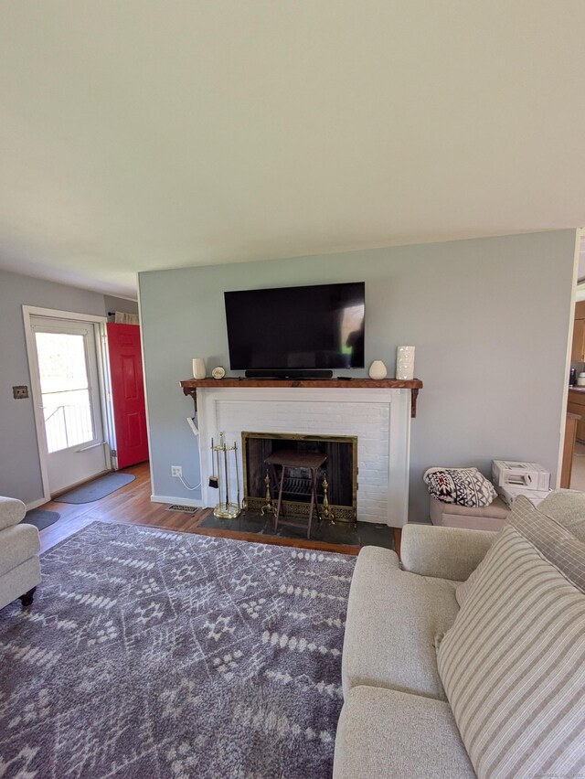264 Timber Ln, Cheshire, CT 06410 - living room featuring wood finished floors and a fireplace