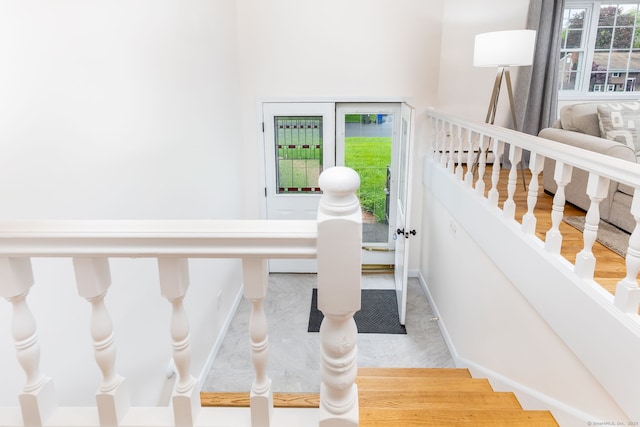 stairs featuring baseboards