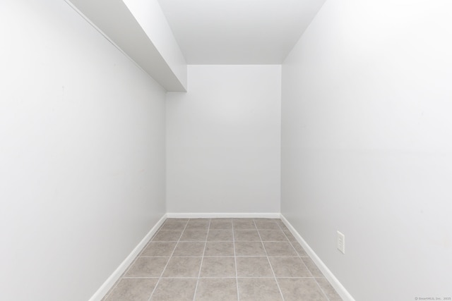 walk in closet featuring light tile patterned floors