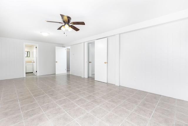 unfurnished living room with a ceiling fan