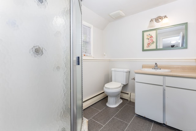bathroom featuring baseboard heating, vaulted ceiling, a stall shower, vanity, and toilet