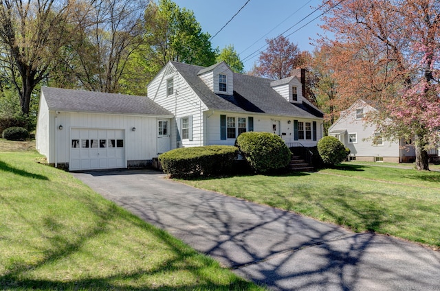 108 Helaine Rd, Manchester, CT 06042 - cape cod house featuring an attached garage, driveway, a chimney, a front lawn, and a shingled roof