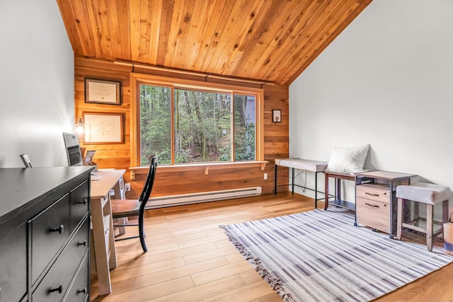 office with wood ceiling, light wood-style flooring, wooden walls, baseboard heating, and vaulted ceiling