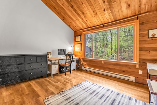 office area featuring wood ceiling, wood finished floors, wood walls, vaulted ceiling, and a baseboard radiator
