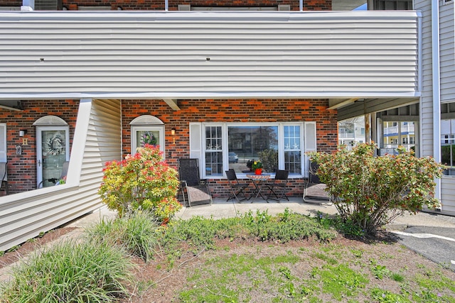 157 Kings Hwy Unit I, Milford, CT 06460 - entrance to property with a patio and brick siding
