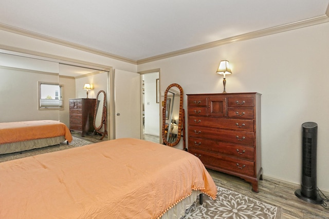 157 Kings Hwy Unit I, Milford, CT 06460 - bedroom with baseboards, ornamental molding, and wood finished floors